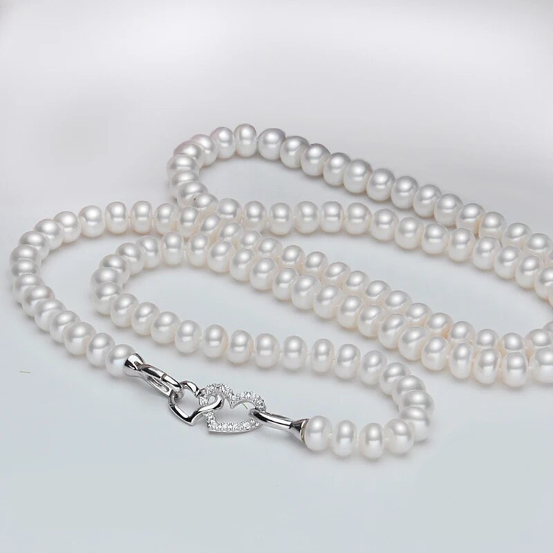 8-9mm, 9-10mm Button Shape.  White Freshwater Pearl Long Necklace.   Natural Flaws.   Silver Connector.